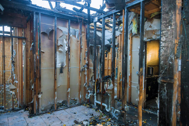 Professional Fire Damage Restoration technician working in Salina, KS